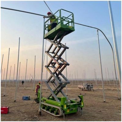 Electric Tracked Scissor Lift Pekerjaan Udara 8m 10m 450kg Lift Hidraulik Seluler