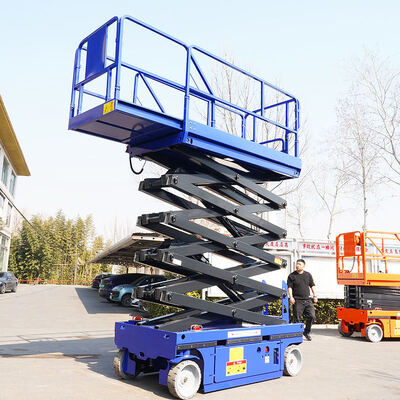 Platform Kerja Udara Hidraulik Angkat Gunting Listrik Self Propelled 450kg 10m